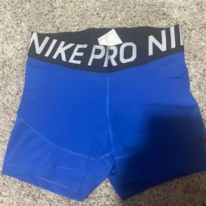 Blue Nike pros